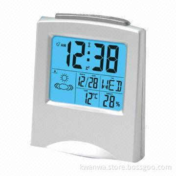 Temperature and humidity display clock with alarm snooze and back light function